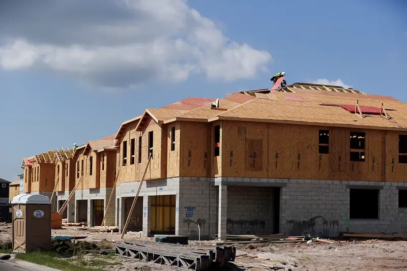 New townhomes are seen under construction while building material supplies are in high demand in Tampa, Florida, U.S., May 5, 2021. REUTERS/Octavio Jones/File Photo