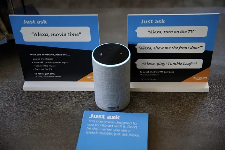Prompts on how to use Amazon's Alexa personal assistant are seen alongside an Amazon Echo in an Amazon ?experience center? in Vallejo, California, U.S., May 8, 2018. Picture taken on May 8, 2018. REUTERS/Elijah Nouvelage/File Photo