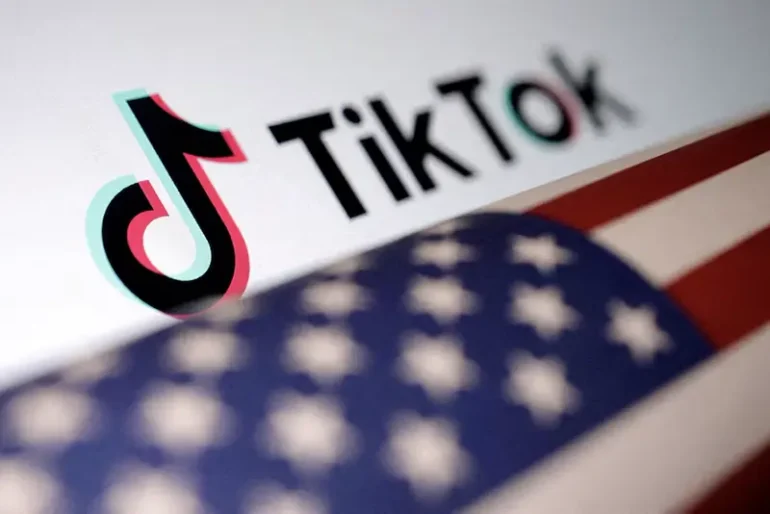 U.S. flag is placed on a TikTok logo in this illustration taken March 20, 2024. REUTERS/Dado Ruvic/Illustration/File Photo
