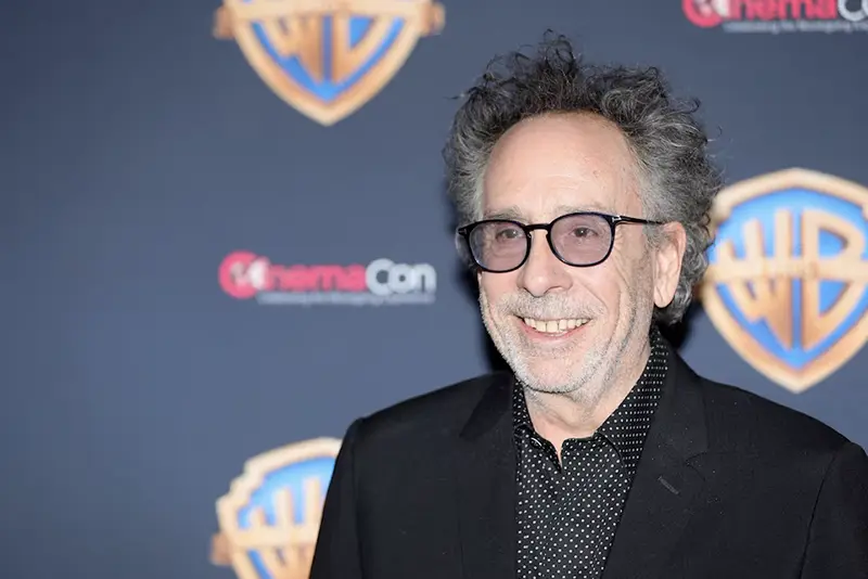 Director and producer Tim Burton, promoting the film Beetlejuice Beetlejuice, poses on the red carpet during a Warner Bros. presentation at CinemaCon, the official convention of the National Association of Theatre Owners, in Las Vegas, Nevada, U.S. April 9, 2024. REUTERS/Steve Marcus/File Photo