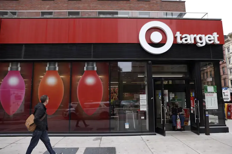 A person walks by a Target store in Manhattan, New York City, U.S., November 22, 2021. REUTERS/Andrew Kelly/File Photo