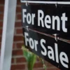 A "For Rent, For Sale" sign is seen outside of a home in Washington, U.S., July 7, 2022. REUTERS/Sarah Silbiger/File Photo