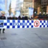 Police tape is seen to control protester movements as 'Reclaim Australia' protesters and counter protesters gather on July 19, 2015 in Sydney, Australia. 'Reclaim Australia' grassroots rallies are being held across Australia to protest the alleged 'Islamisation' of Australia. (Photo by Mark Kolbe/Getty Images)