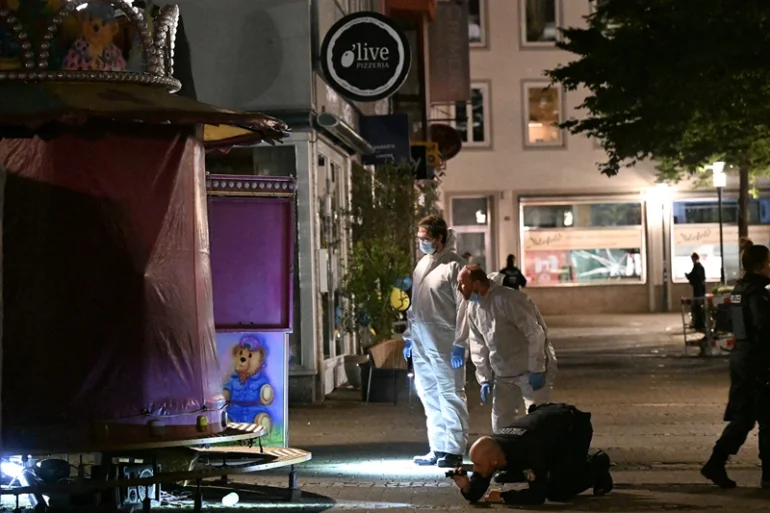 Forensic police inspect on early August 24, 2024 the area where at least three people were killed and several injured when a man attacked them with a knife on late August 23, 2024 in Solingen, western Germany, according to German media, as the city celebrated its 650th anniversary. (Photo by INA FASSBENDER / AFP) (Photo by INA FASSBENDER/AFP via Getty Images)