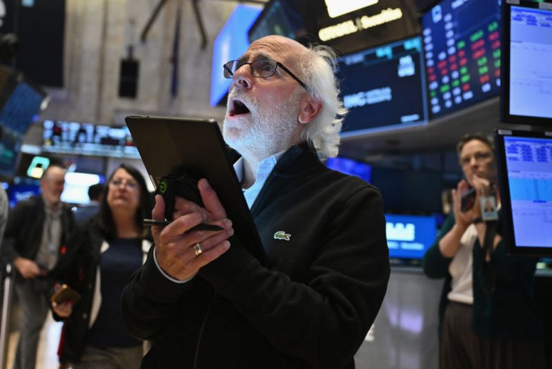 Traders work on the floor of the New York Stock Exchange (NYSE) during morning trading in New York on August 23, 2024. US Federal Reserve Chair Chair Jerome Powell said on August 23 that the "time has come" for the US to start cutting interest rates, adding that his "confidence has grown" that the battle against inflation is on track. "The time has come for policy to adjust," he said in a keynote speech at the Jackson Hole Economic Symposium in Wyoming, according to prepared remarks. (Photo by ANGELA WEISS / AFP) (Photo by ANGELA WEISS/AFP via Getty Images)