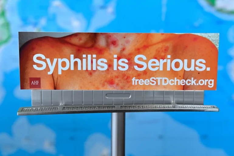 A model of a billboard from the AIDS Healthcare Foundation (AHF) which ran in Los Angeles earlier this year but has been rejected to be displayed in many other cities is seen at the AHF office in Hollywood, California on May 18, 2018. - A billboard on Sunset Boulevard in Hollywood screams out a stark warning: "drug-resistant gonorrhea alert!" Sexually transmitted diseases have made an alarming resurgence across the US, where 2016 saw a record two million cases of chlamydia, gonorrhea and syphilis, including 628 cases of congenital syphilis. But California, the most populous US state, stands out for its willingness to tackle the crisis head-on, with cases of the three ailments up 45 percent in 2017 from five years ago. (Photo by Frederic J. BROWN / AFP) / TO GO WITH AFP STORY by Javier TOVAR, "California on front line as STDs run rampant in US" (Photo credit should read FREDERIC J. BROWN/AFP via Getty Images)