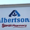 The Albertsons logo is displayed at an Albertsons supermarket on August 26, 2024 in Los Angeles, California. A federal judge in Oregon is hearing arguments today after the Federal Trade Commission and several states sued to block the planned merger between grocery chains Kroger and Albertsons. (Photo by Mario Tama/Getty Images)