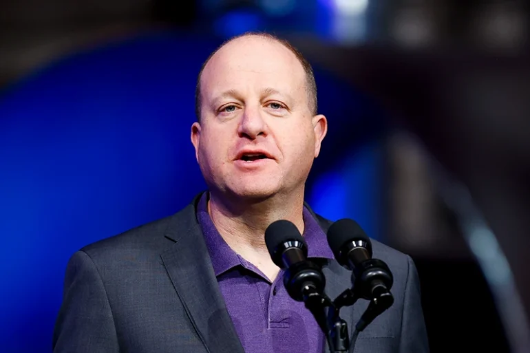 Gov. Polis Denies Migrants’ ‘Apartment Complex Takeover’ Despite Video Evidence, Police Reports, And Mayor’s Confirmation – One America News Network