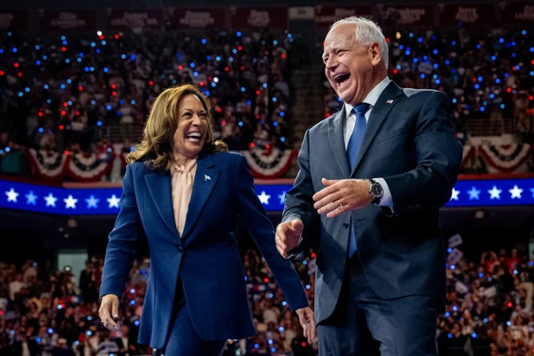 Democratic presidential candidate, U.S. Vice President Kamala Harris and Democratic vice presidential nominee Minnesota Gov. Tim Walz walk out on stage together during a campaign event on August 6, 2024 in Philadelphia, Pennsylvania. Harris ended weeks of speculation about who her running mate would be, selecting the 60 year old midwestern governor over other candidates. (Photo by Andrew Harnik/Getty Images)