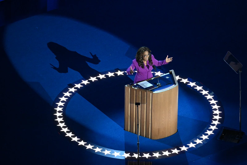 TOPSHOT - US television host and producer Oprah Winfrey speaks on the third day of the Democratic National Convention (DNC) at the United Center in Chicago, Illinois, on August 21, 2024. Vice President Kamala Harris will formally accept the party's nomination for president at the DNC which runs from August 19-22 in Chicago. (Photo by Eva HAMBACH / AFP) (Photo by EVA HAMBACH/AFP via Getty Images)