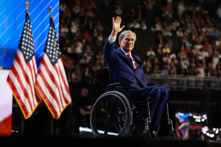 MILWAUKEE, WISCONSIN - JULY 17: Texas Gov. Greg Abbott waves on stage on the third day of the Republican National Convention at the Fiserv Forum on July 17, 2024 in Milwaukee, Wisconsin. Delegates, politicians, and the Republican faithful are in Milwaukee for the annual convention, concluding with former President Donald Trump accepting his party's presidential nomination. The RNC takes place from July 15-18. (Photo by Joe Raedle/Getty Images)