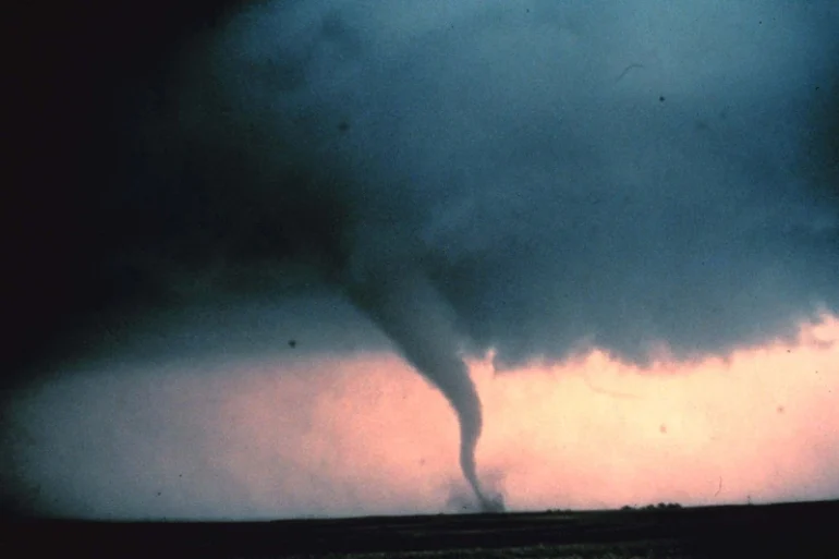 View of the 'rope' or decay stage of tornado seen during 'Sound Chase,' a joint project of NSSL and Mississippi State University in Cordell, Oklahoma May 22, 1981. (Photo by NOAA Photo Library/Getty Images)