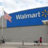 MIAMI, FLORIDA - JANUARY 24: A customer leaves a Walmart store on January 24, 2023 in Miami, Florida. Walmart announced that it is raising its minimum wage for store employees in early March, store employees will make between $14 and $19 an hour. They currently earn between $12 and $18 an hour. (Photo by Joe Raedle/Getty Images)