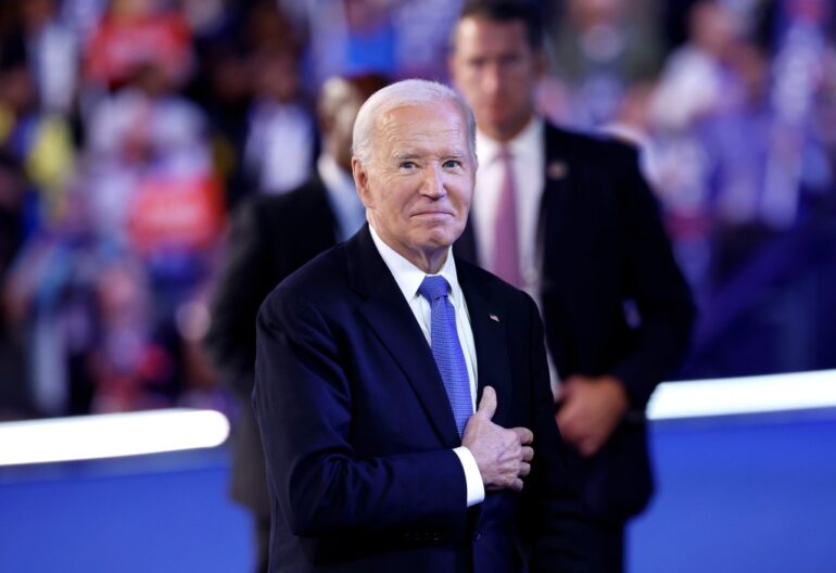 President Biden acknowledges applause after the President's speech during the first day of the Democratic National Convention at the United Center on Aug. 19, 2024 in Chicago, Illinois.