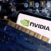 A smartphone with a displayed NVIDIA logo is placed on a computer motherboard in this illustration taken March 6, 2023. REUTERS/Dado Ruvic/Illustration/File Photo