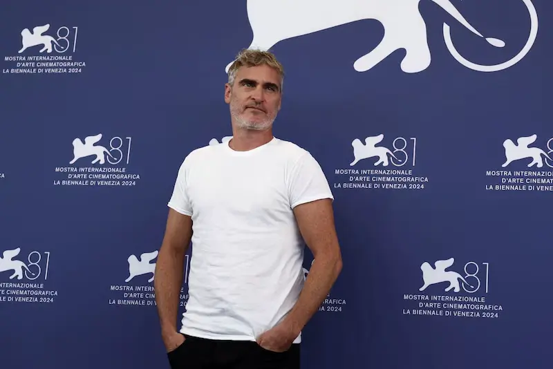 Cast member Joaquin Phoenix poses during a photocall for the movie "Joker: Folie a Deux", in competition, at the 81st Venice Film Festival, Venice, Italy, September 4, 2024. REUTERS/Yara Nardi