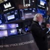 A trader works on the trading floor at The New York Stock Exchange (NYSE) following the Federal Reserve rate announcement, in New York City, U.S., September 18, 2024. REUTERS/Andrew Kelly