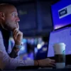 A specialist trader works inside a post on the floor at the New York Stock Exchange (NYSE) in New York City, U.S., September 9, 2024. REUTERS/Brendan McDermid/File Photo