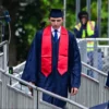 Barron Trump, son of former US President Donald Trump and former First Lady Melania Trump, takes part in his graduation at Oxbridge Academy in Palm Beach, Florida, May 17, 2024. (Photo by Giorgio VIERA / AFP) (Photo by GIORGIO VIERA/AFP via Getty Images)