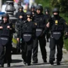 Police officers secure the area after a shooting near the building of the Documentation Centre for the History of National Socialism (NS-Dokumentationszentrum) in Munich, southern Germany, on September 5, 2024. German police said they shot a suspect in central Munich on September 5, near the documentation centre on the Nazi era and the Israeli consulate, and advised people to stay clear of the area. (Photo by LUKAS BARTH-TUTTAS / AFP) (Photo by LUKAS BARTH-TUTTAS/AFP via Getty Images)