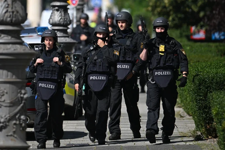 Police officers secure the area after a shooting near the building of the Documentation Centre for the History of National Socialism (NS-Dokumentationszentrum) in Munich, southern Germany, on September 5, 2024. German police said they shot a suspect in central Munich on September 5, near the documentation centre on the Nazi era and the Israeli consulate, and advised people to stay clear of the area. (Photo by LUKAS BARTH-TUTTAS / AFP) (Photo by LUKAS BARTH-TUTTAS/AFP via Getty Images)