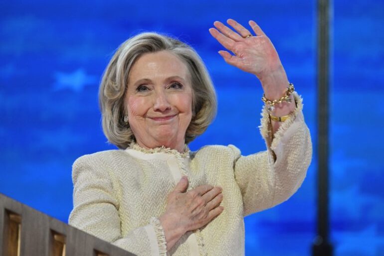 Former US Secretary of State Hillary Clinton speaks on stage on the first day of the Democratic National Convention (DNC) at the United Center in Chicago, Illinois, on August 19, 2024. Vice President Kamala Harris will formally accept the party's nomination for president at the DNC which runs from August 19-22 in Chicago. (Photo by Robyn Beck / AFP) (Photo by ROBYN BECK/AFP via Getty Images)