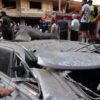 People check the damage following an Israeli strike in Beirut's southern suburbs on September 20, 2024. The Israeli military announced that the commander of Hezbollah's elite Radwan unit, Ibrahim Aqil, and other senior figures of the Lebanese armed group had been killed in the air strike. (Photo by ANWAR AMRO / AFP) (Photo by ANWAR AMRO/AFP via Getty Images)