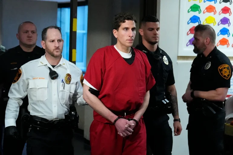 Bryan Kohberger, who is accused of killing four University of Idaho students, leaves after an extradition hearing at the Monroe County Courthouse in Stroudsburg, Pa., Tuesday, Jan. 3, 2023. (AP Photo/Matt Rourke, Pool)