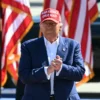 Former US President and Republican presidential candidate Donald Trump arrives onstage to speak during a campaign rally at the Aero Center in Wilmington, North Carolina, September 21, 2024. (Photo by Jim WATSON / AFP) (Photo by JIM WATSON/AFP via Getty Images)