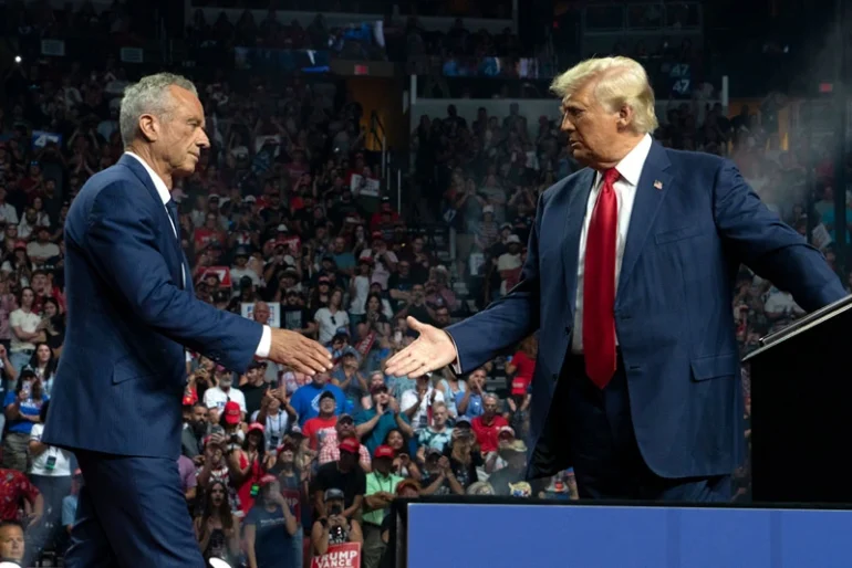 GLENDALE, ARIZONA - AUGUST 23: Former Republican presidential candidate Robert F. Kennedy Jr. and Republican presidential nominee, former U.S. President Donald Trump shake hands during a campaign rally at Desert Diamond Arena on August 23, 2024 in Glendale, Arizona. Kennedy announced today that he was suspending his presidential campaign and supporting former President Trump. (Photo by Rebecca Noble/Getty Images)