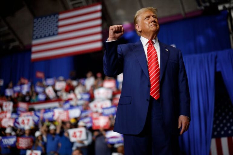 JOHNSTOWN, PENNSYLVANIA - AUGUST 30: Republican presidential nominee, former U.S. President Donald Trump takes the stage during a campaign rally in the 1st Summit Arena at the Cambria County War Memorial on August 30, 2024 in Johnstown, Pennsylvania. Promising to cut energy bills in half, conduct the largest deportation operation in history and put a 200% tariff on foreign made automobiles, Trump rallied his supporters in the all-important battleground state of Pennsylvania. (Photo by Chip Somodevilla/Getty Images)