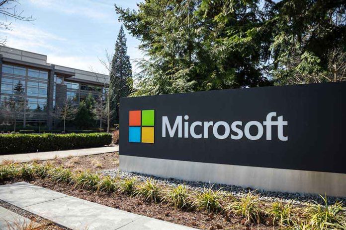 Microsoft sign with office buildings and trees.