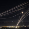 Rockets fired from southern Lebanon are intercepted by Israeli Iron Dome air defence systems over the Upper Galilee region in northern Israel, August 3, 2024