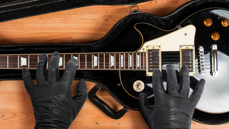 Satire News: Hit Man Opens Guitar Case Concealing Guitar He