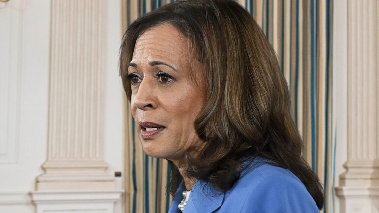 Satire News: Kamala Harris Struggling To Button Pantsuit After Month