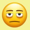 Yellow emoji with a sad face and bags under the eyes, one of eight new emojis coming to smartphones next year