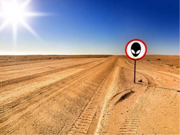 Alien warning sign in a desert.