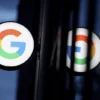 The logo for Google is seen at the Google Store Chelsea in Manhattan, New York City, U.S., November 17, 2021. REUTERS/Andrew Kelly/File Photo