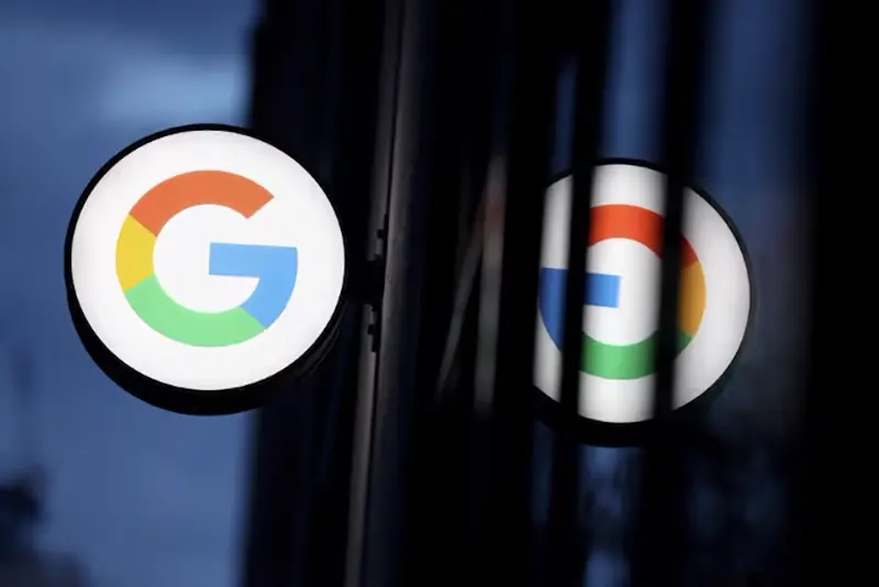 The logo for Google is seen at the Google Store Chelsea in Manhattan, New York City, U.S., November 17, 2021. REUTERS/Andrew Kelly/File Photo