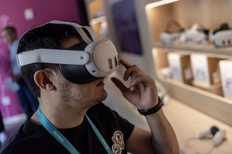 A guest attends a presentation of the updated virtual reality headset during the Meta Connect event at the company's headquarters in Menlo Park, California, U.S., September 27, 2023. REUTERS/Carlos Barria/File Photo