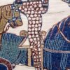 William is depicted in the Bayeux Tapestry during the Battle of Hastings, lifting his helmet to show that he is still alive. (Public Domain)