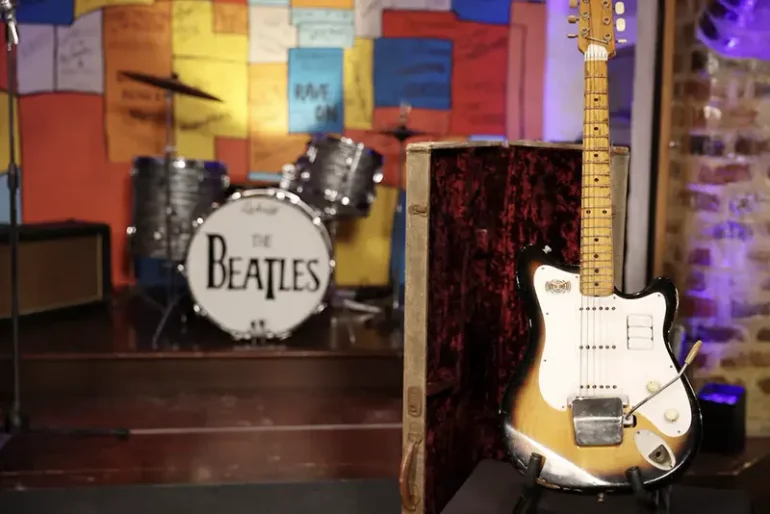 A 'Futurama' guitar that used to belong to the late George Harrison, former member of The Beatles, is displayed on a stage at a press conference held by Julien's Auctions to announce its forthcoming sale by auction in Liverpool, Britain, October 3, 2024. REUTERS/Phil Noble