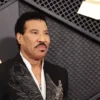 Lionel Richie poses on the red carpet as he attends the 66th Annual Grammy Awards in Los Angeles, California, U.S., February 4, 2024. REUTERS/Mario Anzuoni/File Photo