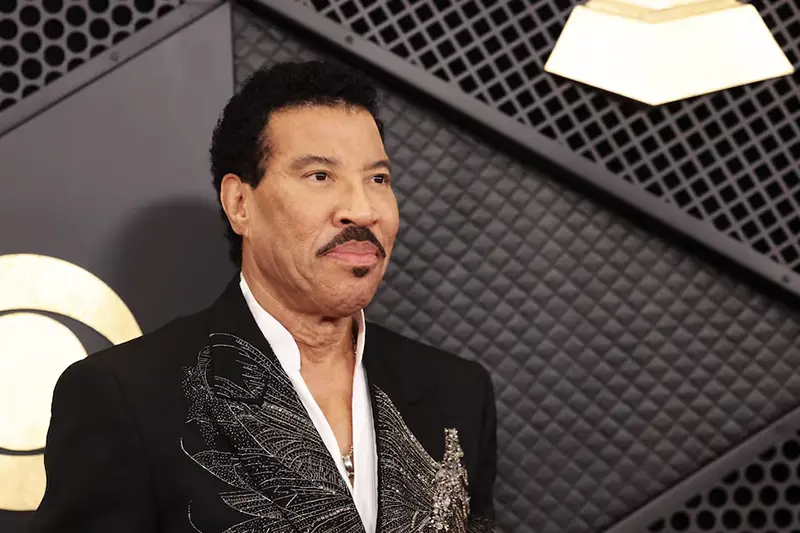 Lionel Richie poses on the red carpet as he attends the 66th Annual Grammy Awards in Los Angeles, California, U.S., February 4, 2024. REUTERS/Mario Anzuoni/File Photo