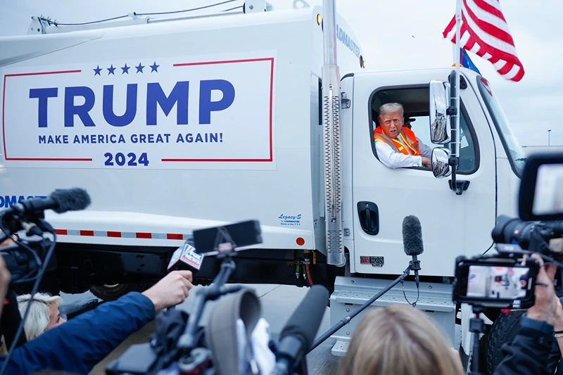 GREEN BAY, WISCONSIN - OCTOBER 30: (EDITOR'S NOTE: Alternate crop) Republican presidential nominee, former President Donald Trump holds a press conference from inside trash hauler at Green Bay Austin Straubel International Airport on October 30, 2024 in Green Bay, Wisconsin. With less than a week until Election Day, Trump is campaigning for re-election in the battleground states of North Carolina and Wisconsin. (Photo by Chip Somodevilla/Getty Images)