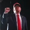 Republican presidential nominee, former U.S. President Donald Trump gestures as he walks offstage after speaking at a campaign rally on October 12, 2024 in Coachella, California. With 24 days to go until election day, former President Donald Trump is detouring from swing states to hold the rally in Democratic presidential nominee, Vice President Kamala Harris' home state. (Photo by Mario Tama/Getty Images)