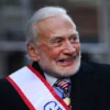 Grand Marshal space pioneer Buzz Aldrin drives up Fifth Avenue in a convertible during the Veterans Day Parade on November 11, 2017 in New York City. The largest Veterans Day event in the nation, this year's parade features thousands of marchers, including military units, civic and youth groups, businesses and high school bands from across the country and veterans of all eras. The U.S. Air Force is this year's featured service. (Photo by Spencer Platt/Getty Images)