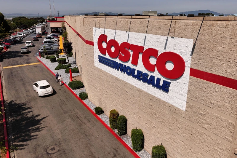 RICHMOND, CALIFORNIA - JULY 11: In an aerial view, the Costco logo is displayed on the exterior of a Costco store on July 11, 2024 in Richmond, California. Costco announced plans to raise membership fees for the first time since 2017 with a $5 jump to $65 a year from $60. (Photo by Justin Sullivan/Getty Images)