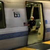 SAN FRANCISCO, CALIFORNIA - APRIL 08: A Bay Area Rapid Transit (BART) passenger rides in an empty train car on April 08, 2020 in San Francisco, California. BART announced that it is slashing daily service as ridership falls dramatically due to the coronavirus shelter in place order. Starting Wednesday, regular Monday through Friday service will be reduced to running trains every half hour between 5 am and 9 pm. (Photo by Justin Sullivan/Getty Images)