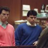 Erik Menendez (L) and his brother Lyle (R) listen during a pre-trial hearing, on December 29, 1992 in Los Angeles after the two pleaded innocent in the August 1989 shotgun deaths of their wealthy parents, Jose and Mary Louise Menendez of Beverly Hills, Calif. It took 40 months for the Superior Court arraignment after prosecutors and defense attorneys battled over the admissibility of taped confessions the brothers allegedly made to their psychotherapist. AFP PHOTO VINCE BUCCI (Photo by VINCE BUCCI / AFP) (Photo by VINCE BUCCI/AFP via Getty Images)